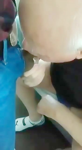 Sucking off a cowboy.