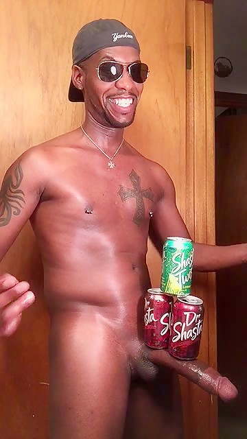 Kenreg builds soda can pyramid