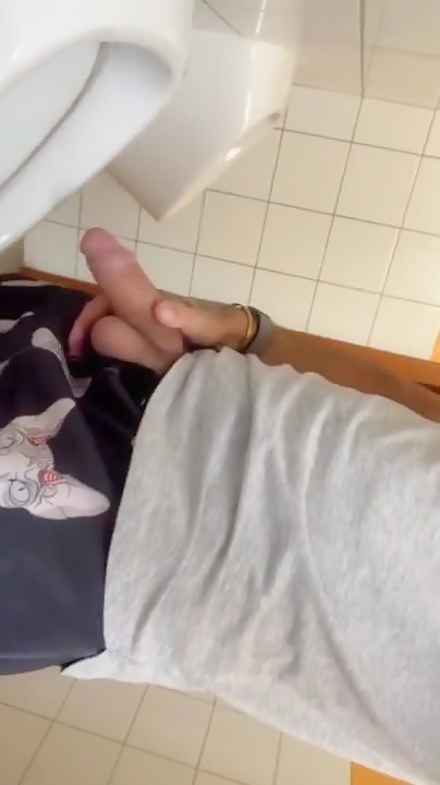 Relieving himself--twice