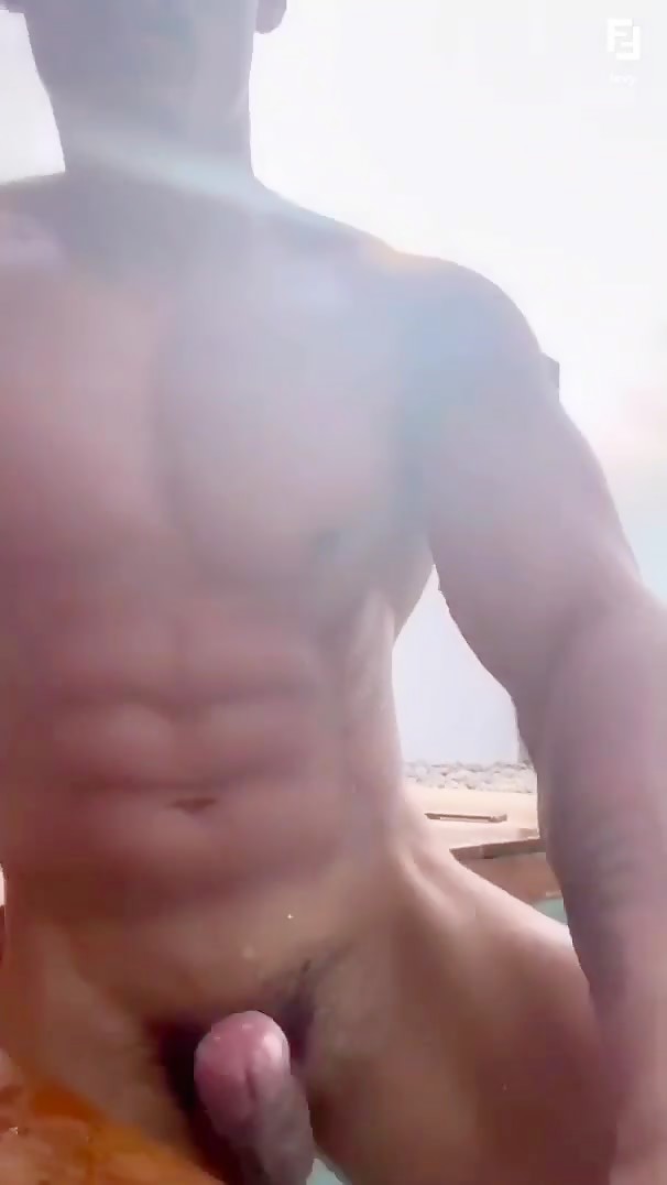 Fitness dude jerking in the pool