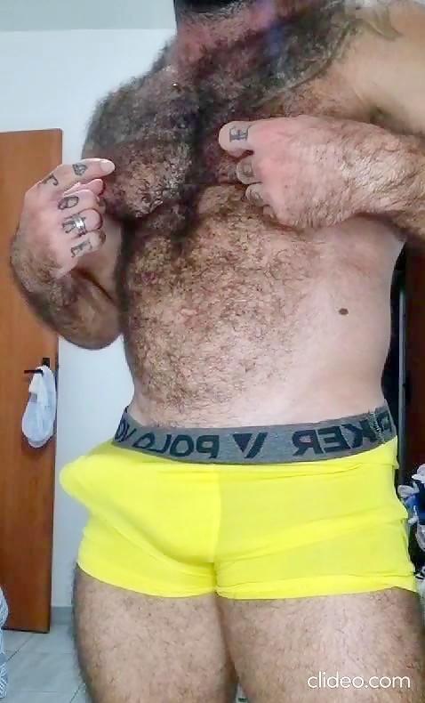 Hairy hunk showing off hard on and smoking