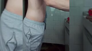 Fat cock in grey shorts